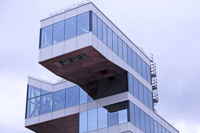 Low angle view of modern building against sky