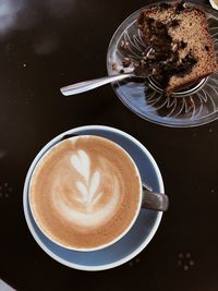 High angle view of cappuccino on table