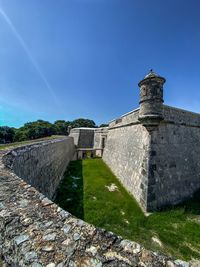 View of fort against blue sky