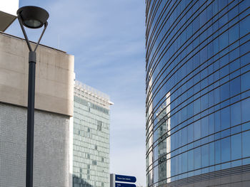 Low angle view of skyscrapers against sky