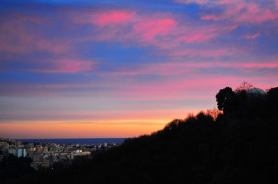 Scenic view of dramatic sky at sunset