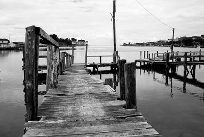 Pier on sea against sky