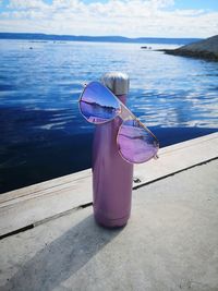 Blue umbrella on sea shore