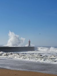 Scenic view of sea against clear sky