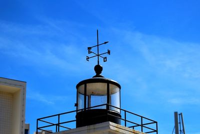 Low angle view of built structure against blue sky