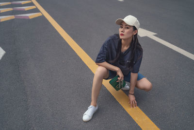 Beautiful woman posing on street