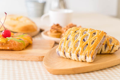 Close-up of bread served on table