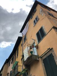 Low angle view of residential building against sky