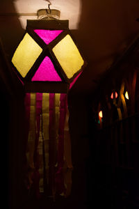 Close-up of illuminated lamp hanging at home