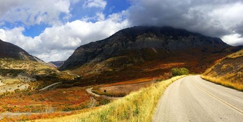 Country road leading towards mountains