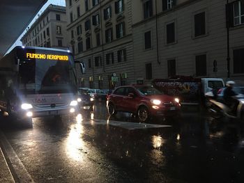 Cars on street at dusk