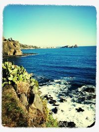 Scenic view of sea against clear sky