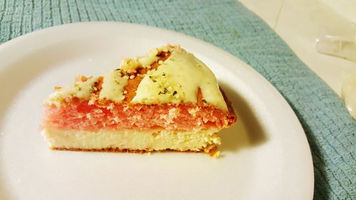 Close-up of strawberry cheesecake in plate