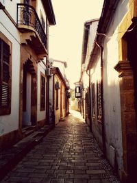 Narrow alley with buildings in background