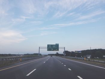 Road in city against sky