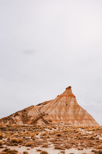 Rock formations on mountain against sky