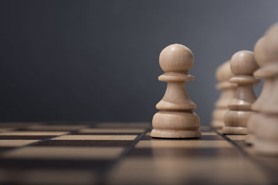 Close-up of chess pieces against blurred background