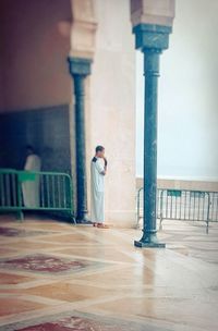 Man standing in building