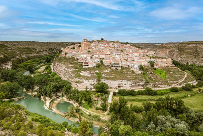 High angle view of buildings against sky