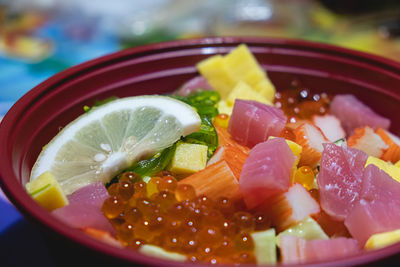 Close-up of fruits in plate on table