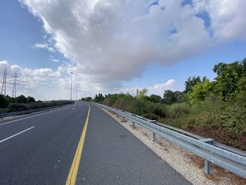 Empty road against sky