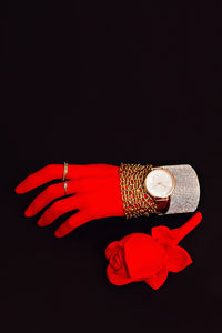 Plastic red hand in fashion jewelry accessories. stylish minimal concept