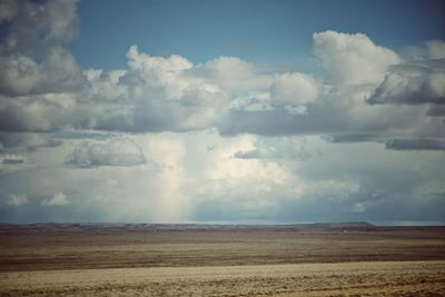 Scenic view of land against sky