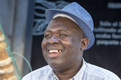 Portrait of smiling man looking away