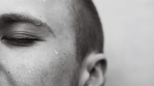 Young woman with eyes closed