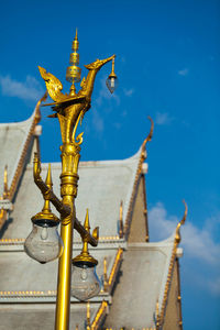 Sculpture of building against blue sky