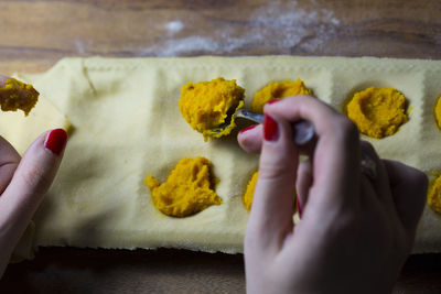 Close-up of woman hand holding food