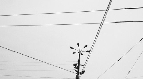 Low angle view of electricity pylon