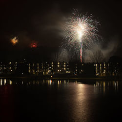 Firework display at night