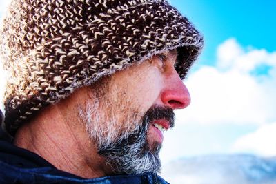 Close-up of mature man wearing knit hat