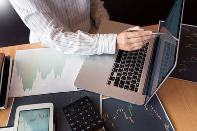 Man using laptop on table