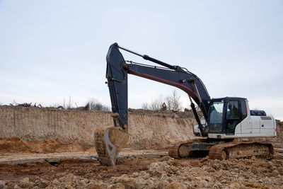 Construction site on field against clear sky