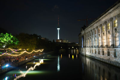 Illuminated buildings in city at night