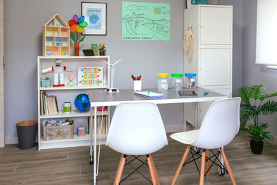 Empty chairs and table at home