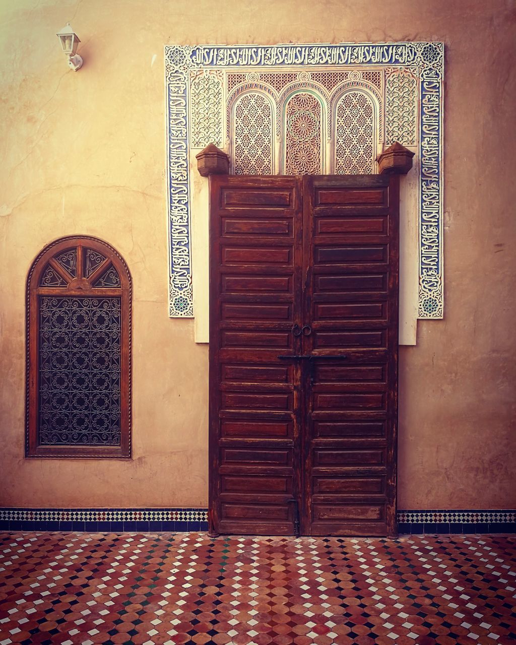 CLOSED WOODEN DOOR OF BUILDING