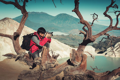 Panoramic view of people walking on mountain