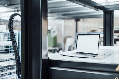 Close-up of laptop on table