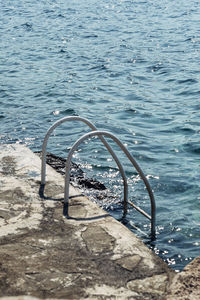 High angle view of swimming pool by sea