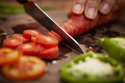 Close-up of person preparing food