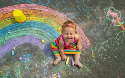 High angle view of cute girl playing in water