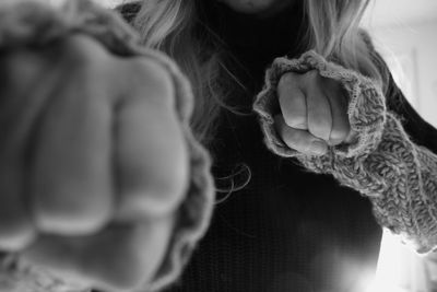 Close-up of woman woman with clenched fist