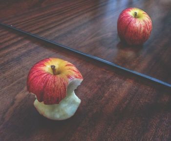 High angle view of apple on table