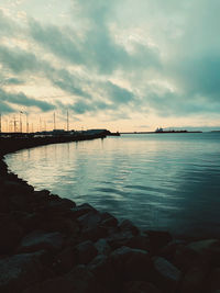 Scenic view of sea against sky during sunset