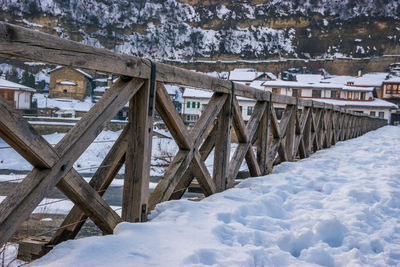 Snow covered trees against sky