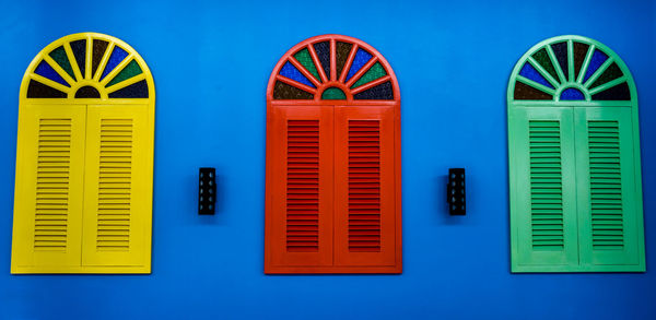 Colorful built structure against blue sky