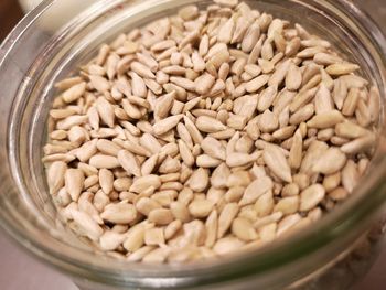 Close-up of coffee beans in glass container